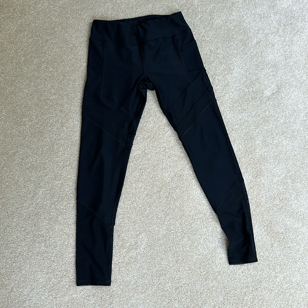 Black workout tights with mesh design